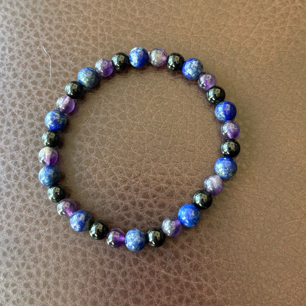 Lapis lazuli, amethyst, and black tourmaline stretch round crystal bracelet 8 in